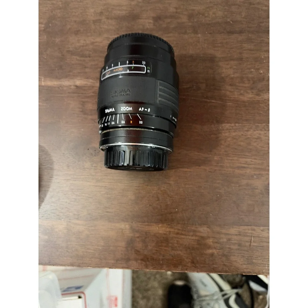Minolta Maxxum 7000 AF 35mm SLR Camera with 50mm and Sigma 60-200mm Lense Manual